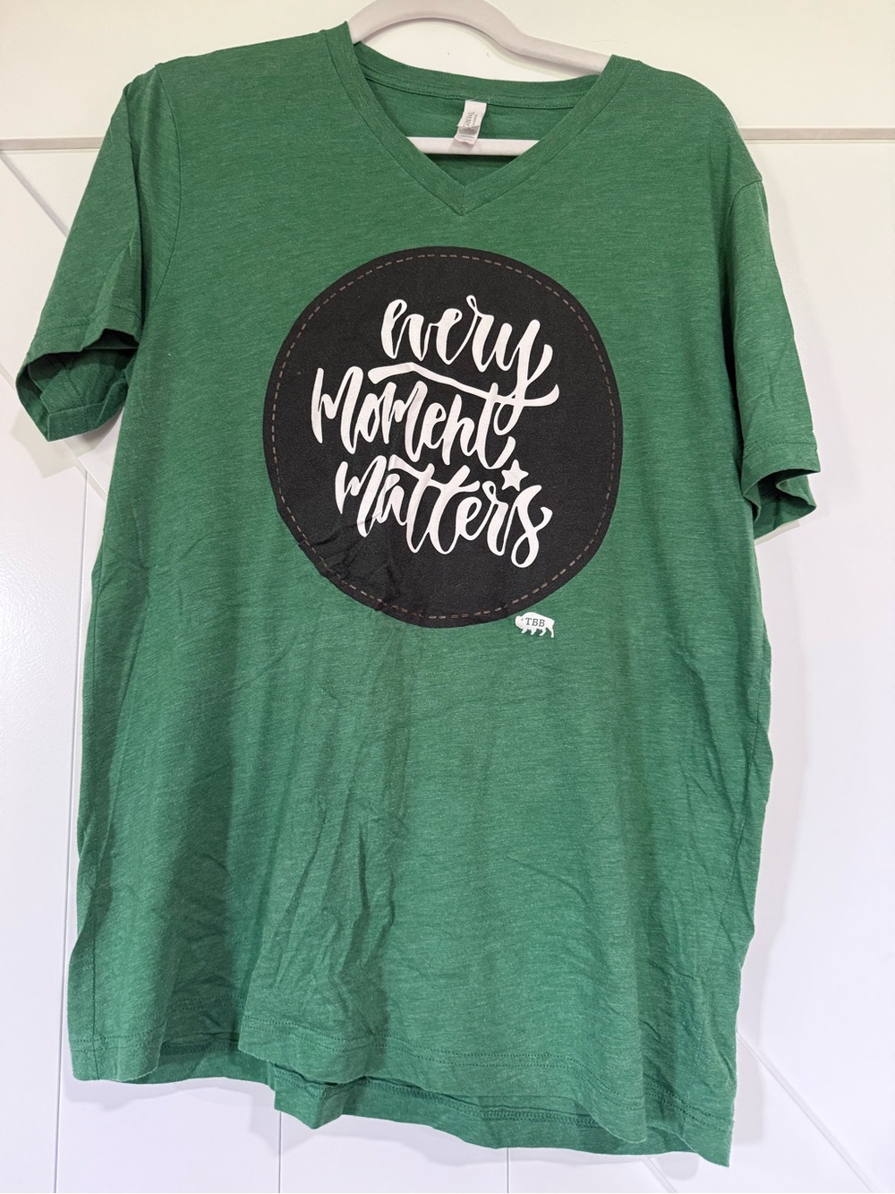 Bella Canvas Green V-Neck Tee with Black Lettering
